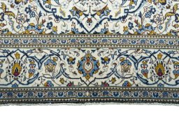 Full view of 2000s Kashan rug from Iran / Persia, 302 × 200 cm in Beige tones