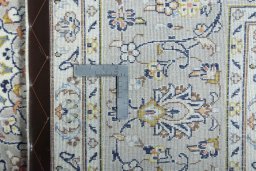 Central medallion detail of 2000s Kashan rug from Iran / Persia