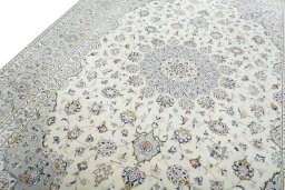 Backside of handmade 2000s Kashan rug showing knot structure and weave density