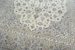 Close-up detail of 2000s Kashan rug from Iran / Persia showing Wool weave