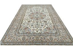 Surface texture of 2000s Kashan rug with natural Wool and intricate pattern