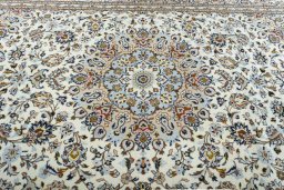 Central medallion detail of 2000s Kashan rug from Iran / Persia