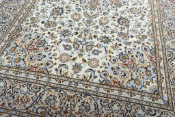 Close-up detail of 2000s Kashan rug from Iran / Persia showing Wool weave