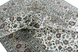 Surface texture of 2000s Kashan rug with natural Wool and intricate pattern