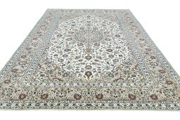 Surface texture of 2000s Kashan rug with natural Wool and intricate pattern