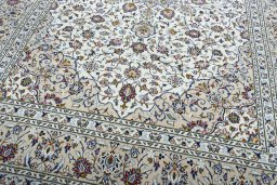 Close-up detail of 2000s Kashan rug from Iran / Persia showing Wool weave