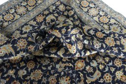 Surface texture of 2000s Kashan rug with natural Wool and intricate pattern