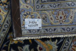 Central medallion detail of 2000s Kashan rug from Iran / Persia