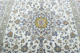 Central medallion detail of 2000s Kashan rug from Iran / Persia