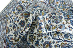 Surface texture of 2000s Kashan rug with natural Wool and intricate pattern