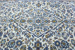 Central medallion detail of 2000s Kashan rug from Iran / Persia