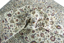 Surface texture of 2000s Kashan rug with natural Wool and intricate pattern
