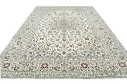 Surface texture of 2000s Kashan rug with natural Wool and intricate pattern