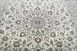 Central medallion detail of 2000s Kashan rug from Iran / Persia