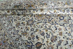 Close-up detail of New Kashan rug from Iran / Persia showing Wool weave