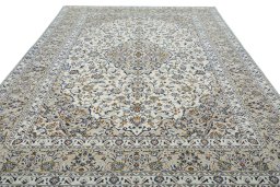 Surface texture of New Kashan rug with natural Wool and intricate pattern