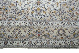 Full view of New Kashan rug from Iran / Persia, 337 × 250 cm in Beige tones