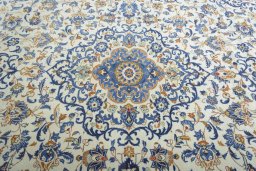 Central medallion detail of 2000s Kashan rug from Iran / Persia