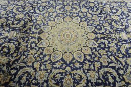 Central medallion detail of New Kashan rug from Iran / Persia
