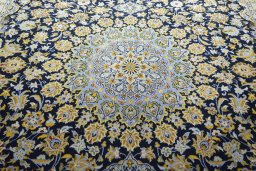 Central medallion detail of 2000s Kashan rug from Iran / Persia