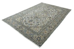 Corner detail of New Kashan rug showing border pattern and Wool pile