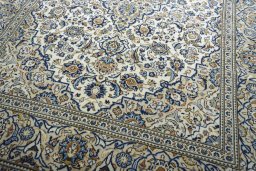 Close-up detail of New Kashan rug from Iran / Persia showing Wool weave