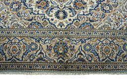 Full view of New Kashan rug from Iran / Persia, 290 × 200 cm in Beige tones