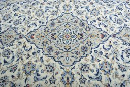Central medallion detail of 2000s Kashan rug from Iran / Persia
