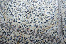 Close-up detail of 2000s Kashan rug from Iran / Persia showing Wool weave