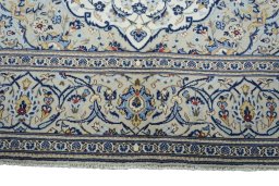 Full view of 2000s Kashan rug from Iran / Persia, 301 × 195 cm in Beige tones