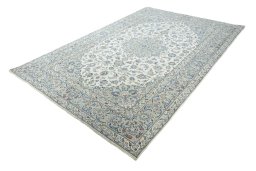 Corner detail of New Kashan rug showing border pattern and Wool pile
