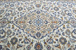 Central medallion detail of 2000s Kashan rug from Iran / Persia