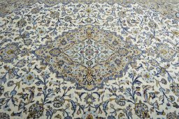 Central medallion detail of 2000s Kashan rug from Iran / Persia