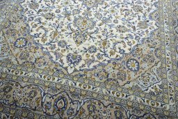 Close-up detail of 2000s Kashan rug from Iran / Persia showing Wool weave