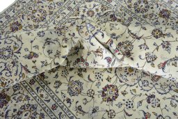Surface texture of New Kashan rug with natural Wool and intricate pattern
