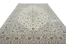 Surface texture of New Kashan rug with natural Wool and intricate pattern