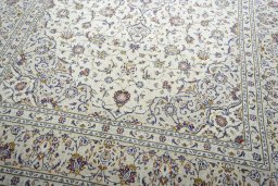 Close-up detail of New Kashan rug from Iran / Persia showing Wool weave