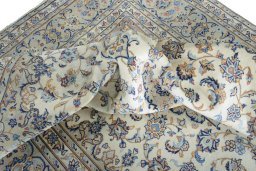 Surface texture of New Kashan rug with natural Wool and intricate pattern