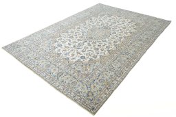 Corner detail of New Kashan rug showing border pattern and Wool pile