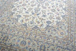 Close-up detail of New Kashan rug from Iran / Persia showing Wool weave