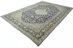 Corner detail of 2000s Kashan rug showing border pattern and Wool pile