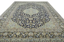 Surface texture of 2000s Kashan rug with natural Wool and intricate pattern