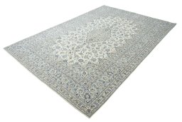 Corner detail of New Kashan rug showing border pattern and Wool pile