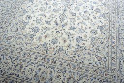 Close-up detail of New Kashan rug from Iran / Persia showing Wool weave