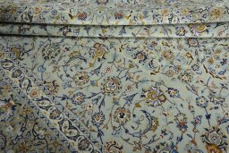 Close-up detail of 2000s Kashan rug from Iran / Persia showing Wool weave