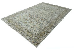 Corner detail of 2000s Kashan rug showing border pattern and Wool pile