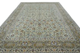 Surface texture of 2000s Kashan rug with natural Wool and intricate pattern