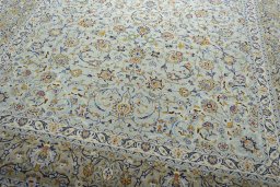 Close-up detail of 2000s Kashan rug from Iran / Persia showing Wool weave