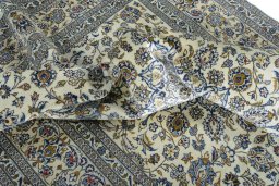 Surface texture of New Kashan rug with natural Wool and intricate pattern