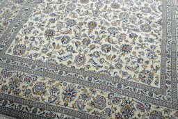 Close-up detail of New Kashan rug from Iran / Persia showing Wool weave